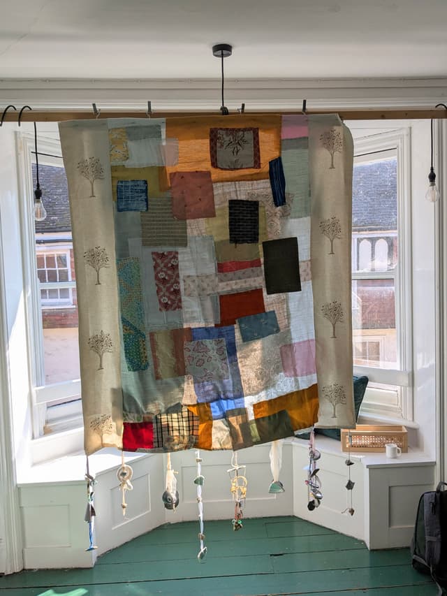 hanging tapestry of different materials