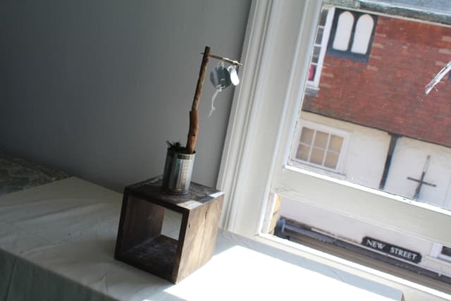 a sculpture of whittled wood